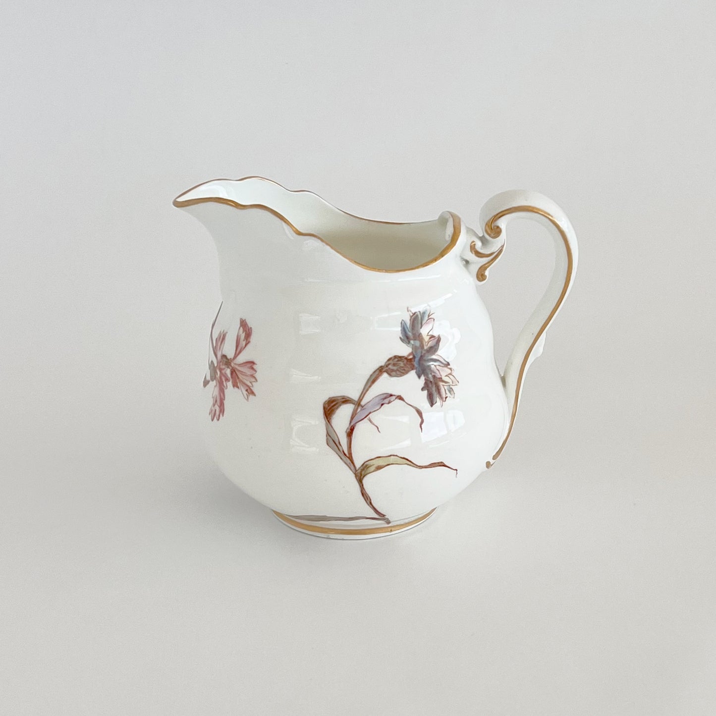English vintage milk jug with corn flower pattern and gilt detail