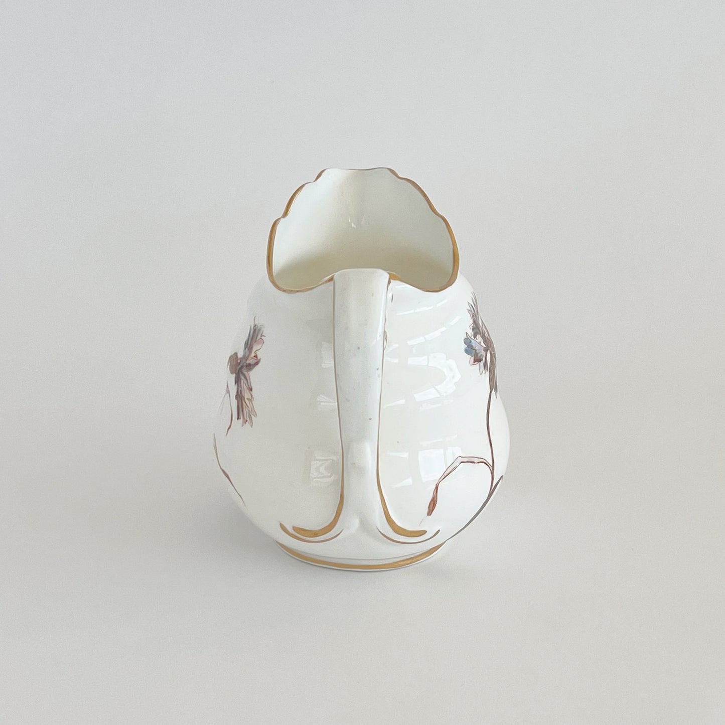 English vintage milk jug with corn flower pattern and gilt detail
