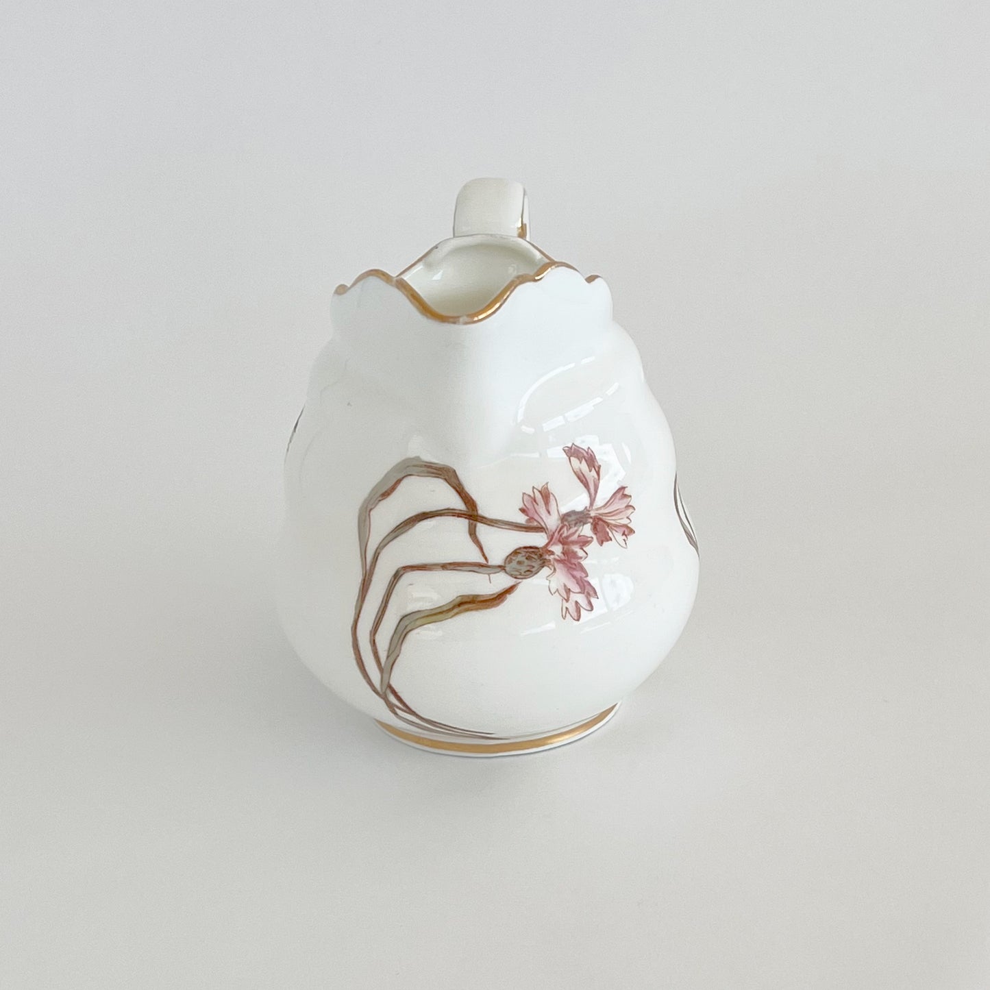 English vintage milk jug with corn flower pattern and gilt detail
