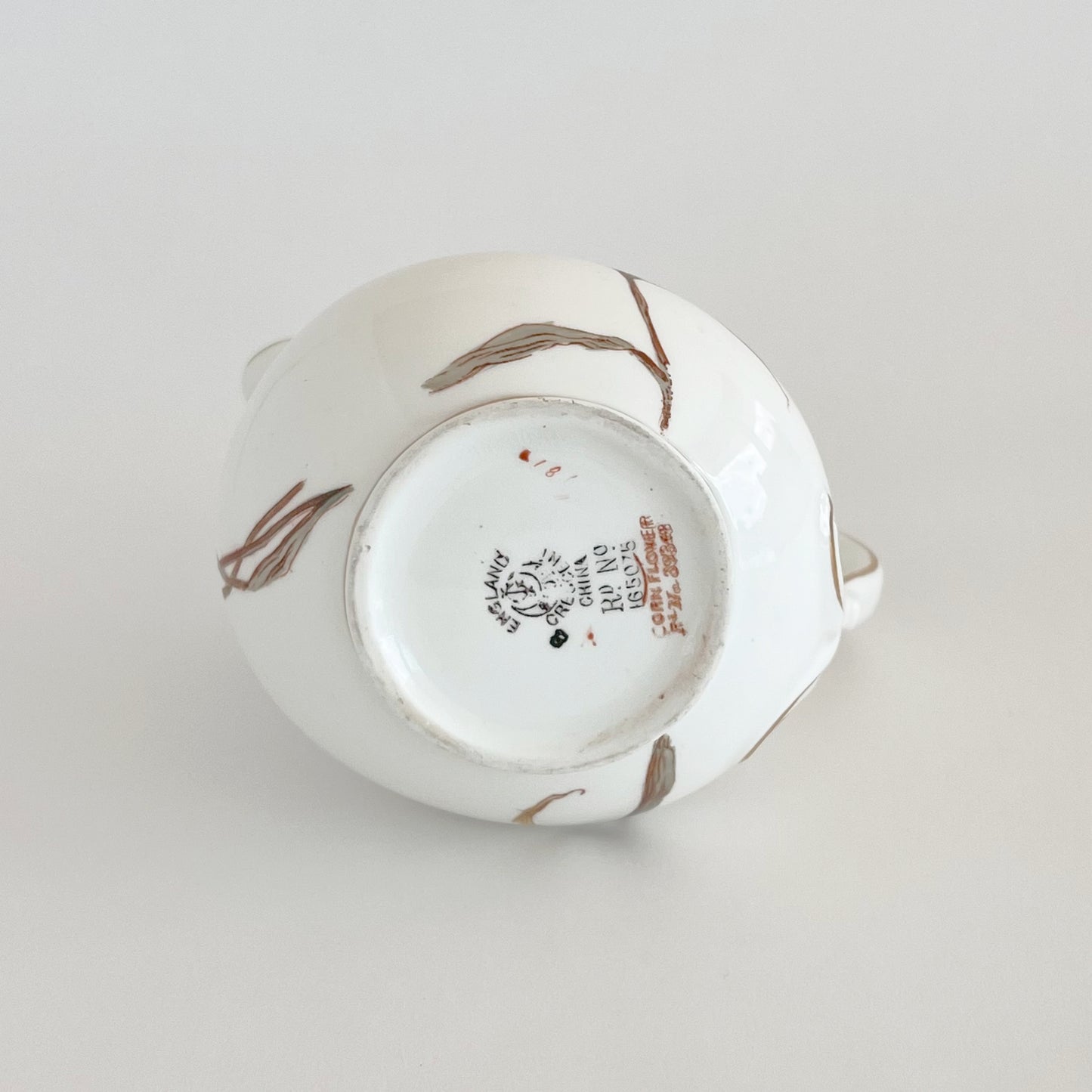 English vintage milk jug with corn flower pattern and gilt detail