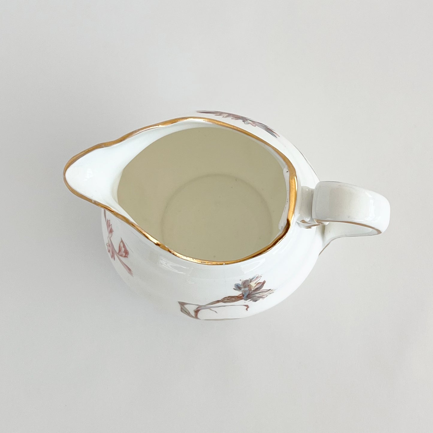 English vintage milk jug with corn flower pattern and gilt detail