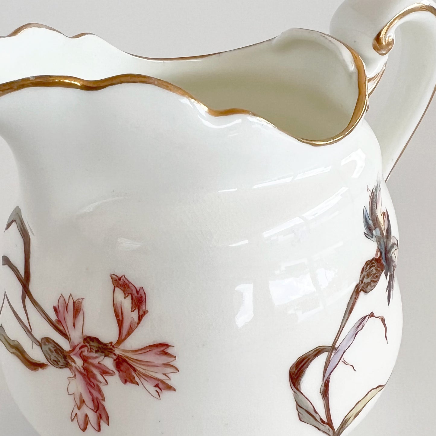 English vintage milk jug with corn flower pattern and gilt detail