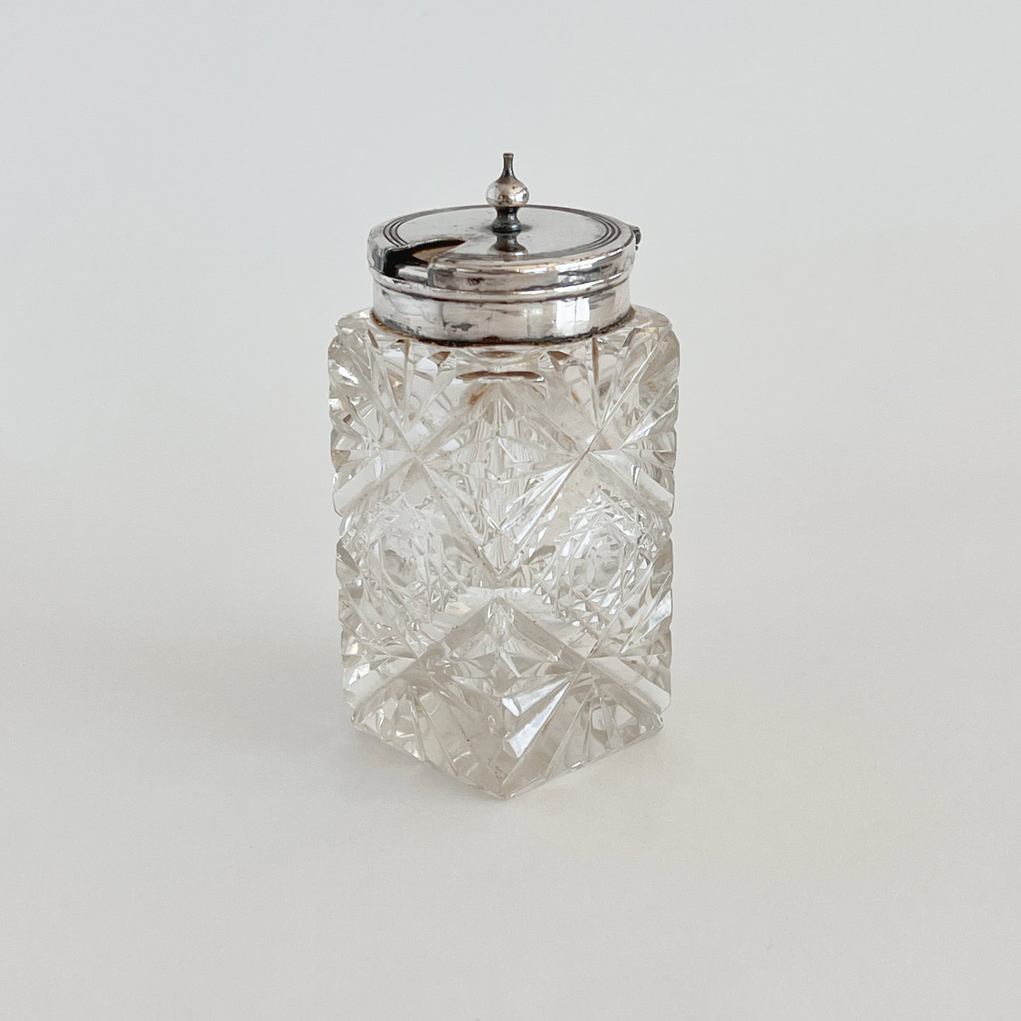 English antique glass mustard pot with silver-plated lid