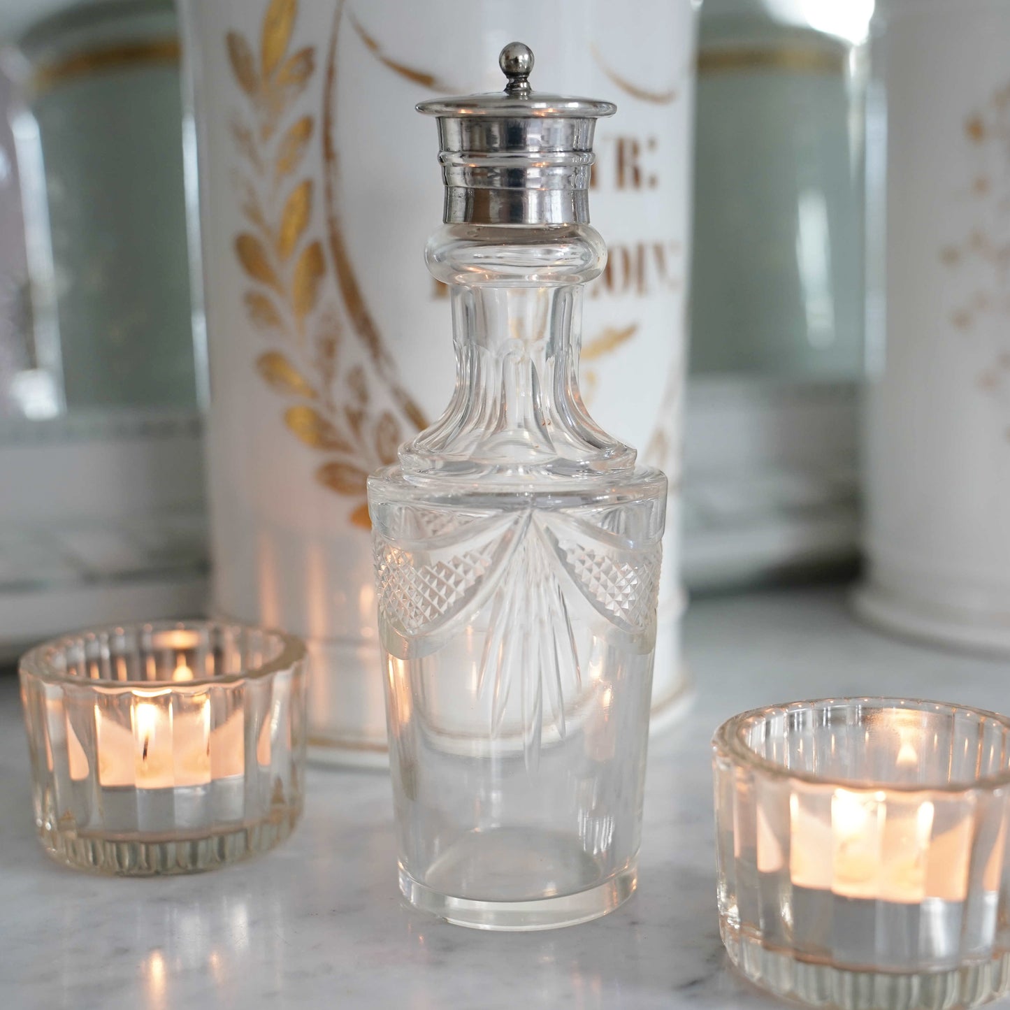 English antique Edwardian lady’s traveling bottle with silver-plated lid