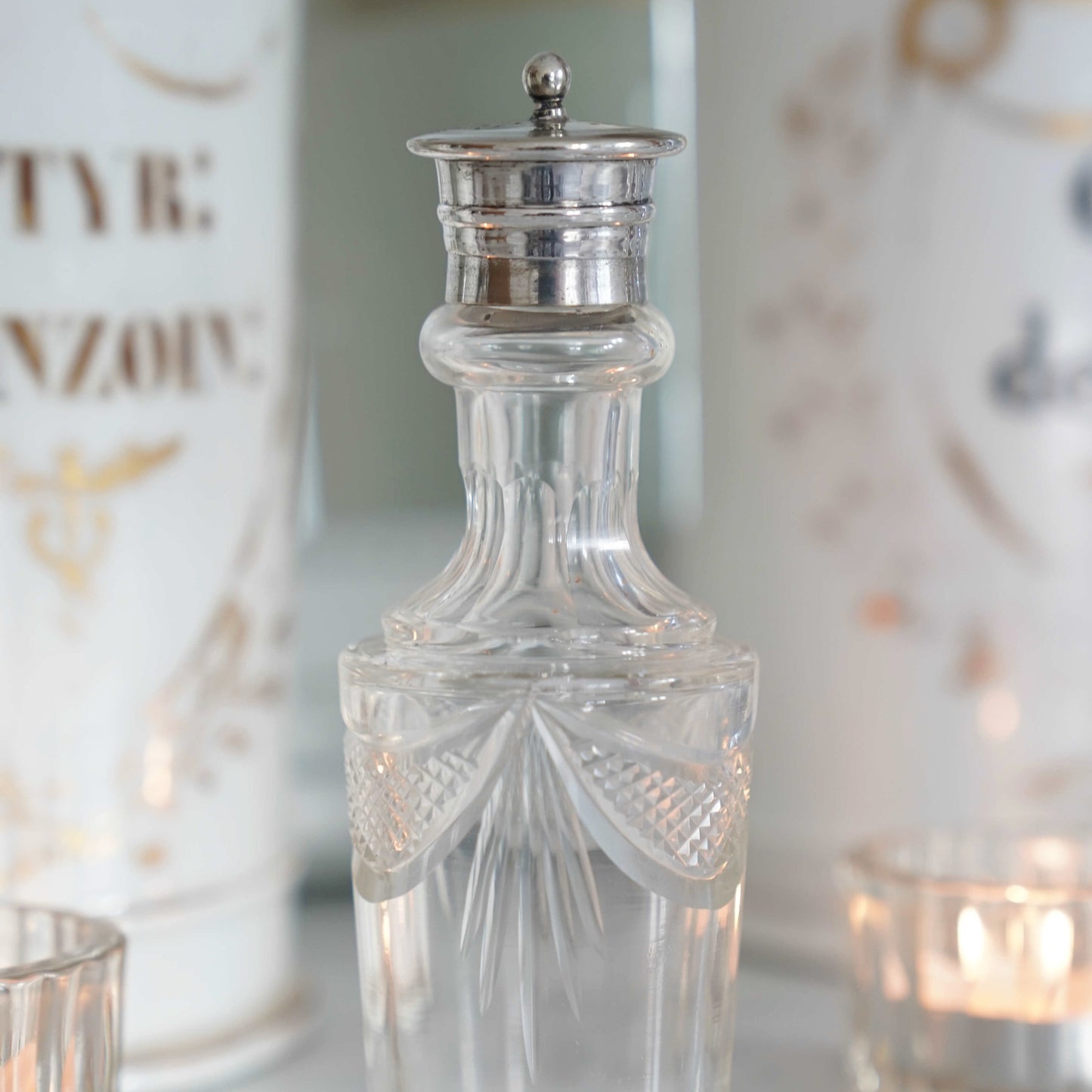 English antique Edwardian lady’s traveling bottle with silver-plated lid