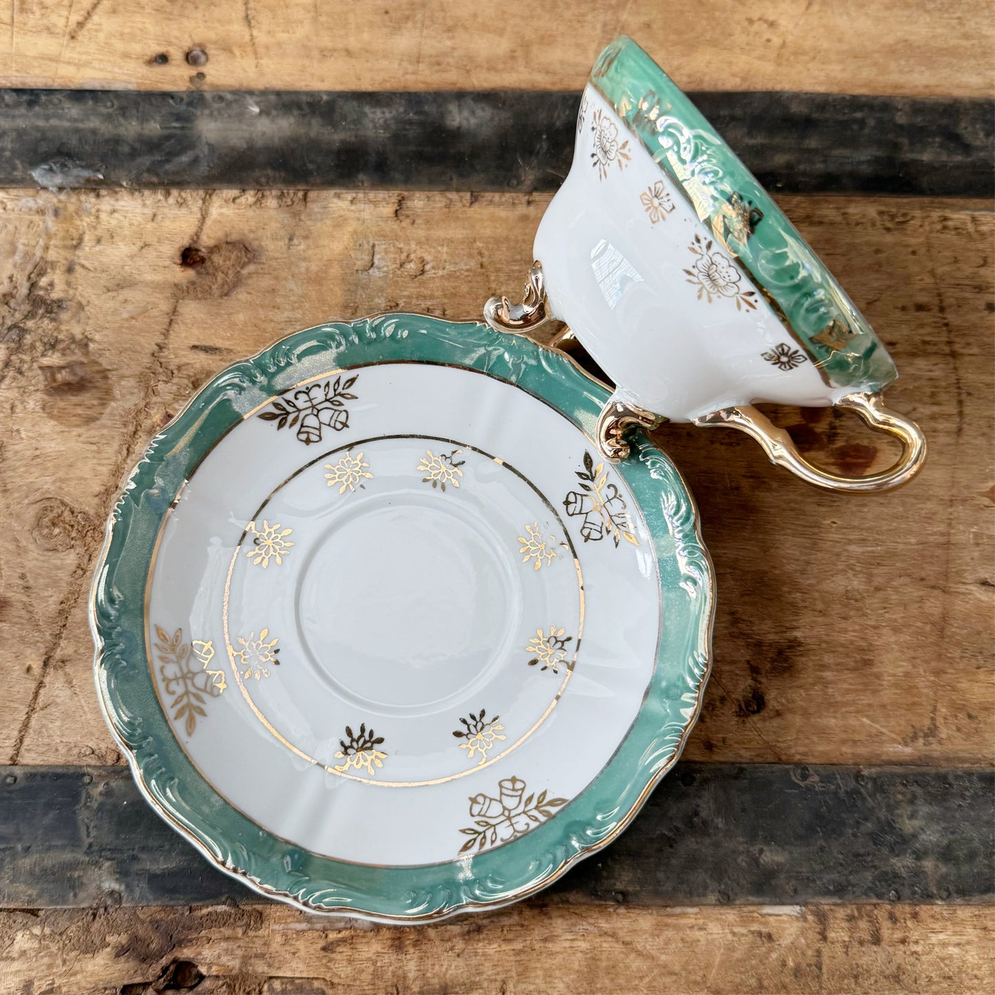 Vintage Green and Gold Trimmed Footed Cup and Saucer Set
