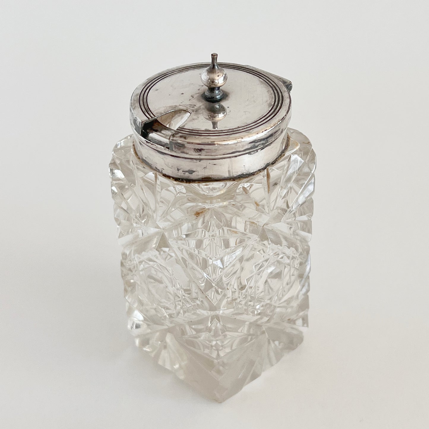 English antique glass mustard pot with silver-plated lid
