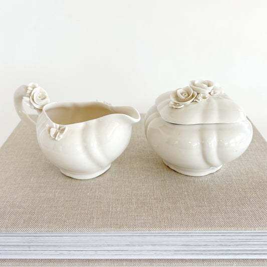 White Creamer and Box with Relief Flowers, sold as pair