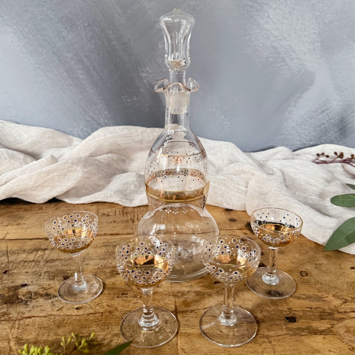 Vintage Bohemian Decanter and Four Tiny Glasses with Gold and Hand-Painted Floral Details, SET