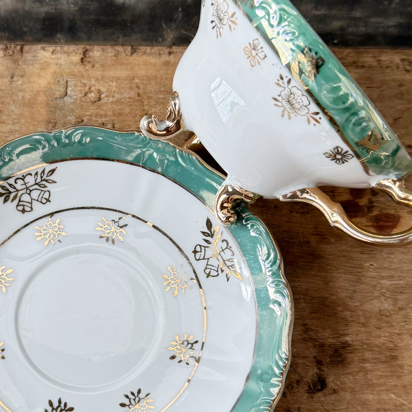 Vintage Green and Gold Trimmed Footed Cup and Saucer Set